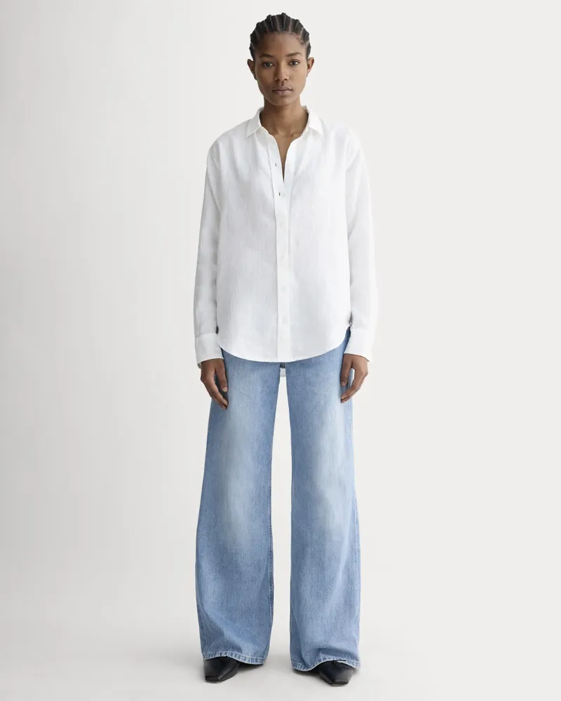 Model wearing the oversized white linen shirt